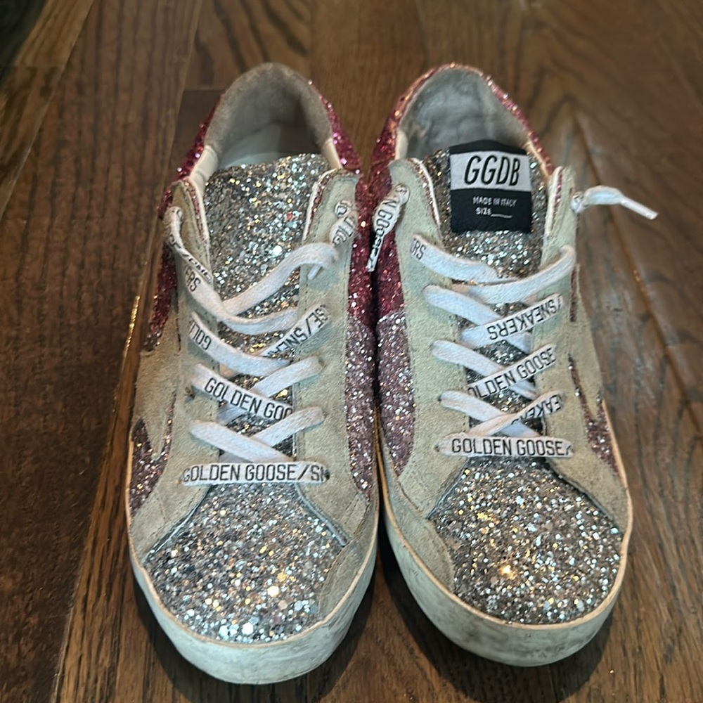 Size 38! Worn twice! Left shoe has defect inside back of sneaker (see pics)
